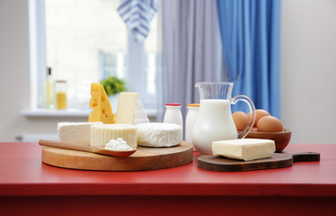 Different dairy products on kitchen table