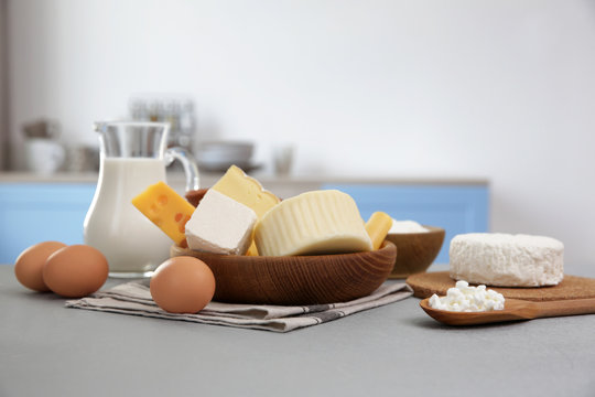 Different dairy products on kitchen table