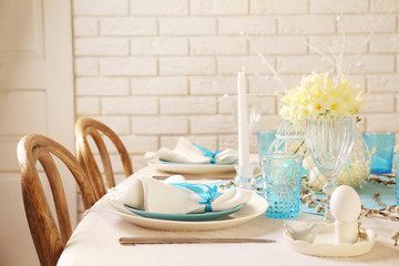 Beautiful Easter table setting with decorations