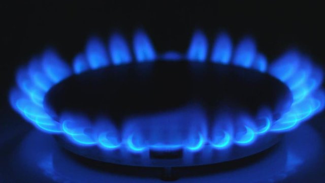 Gas burning from a kitchen gas stove slow motion