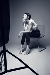 Fototapeta na wymiar Young woman in studio