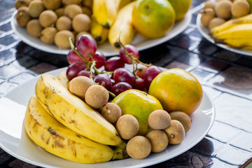 banana, orange, grape and longan