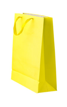 Yellow shopping bags on white