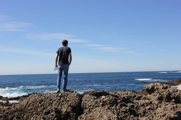 Man Looking at Ocean