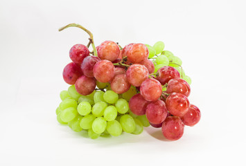 Green and Red grape with leaves isolated on white. With clipping path. Full depth of field.