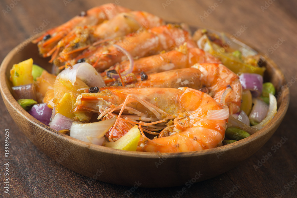 Poster chilli prawns in traditional setting