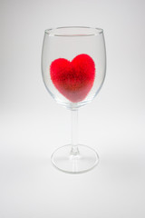 Red velvet fluffy heart in Stemware On a white background