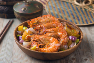 chilli prawns in traditional setting