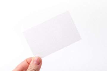 Fototapeta premium Business cards isolated on white holding in hands