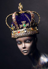 Mannequin in creative golden crown