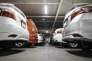 Cars on the parking lot brighter tone.