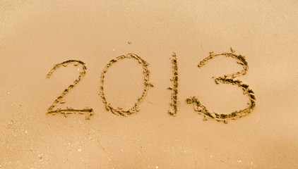 new 2013 year date written in sand
