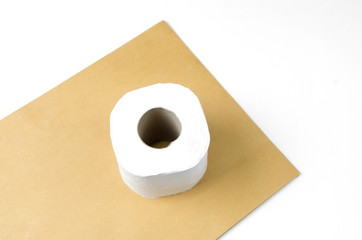 paper toilet rolls on brown background
