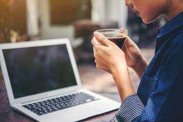 women drinking coffee and laptop,online shopping concept.
