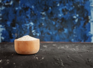 Rice in a bowl. Ingredient. The concept of healthy eating and vegetarianism.