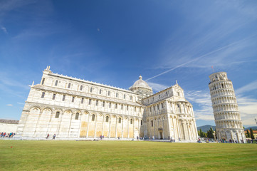 Fototapeta premium Piazza dei miracoli, with the Basilica and the leaning tower. Pisa, Italy.
