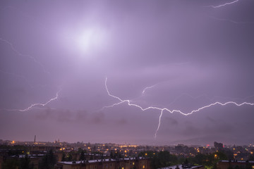 Naklejka na ściany i meble powerful lightning over the city