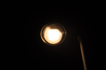 Fototapeta na wymiar luminous street lantern at the night