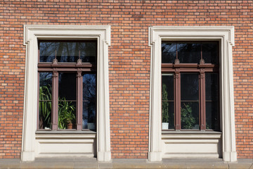 Fototapeta na wymiar Two vintage front glass windows of an old house