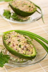 Salad of avocado and tuna on glass plates