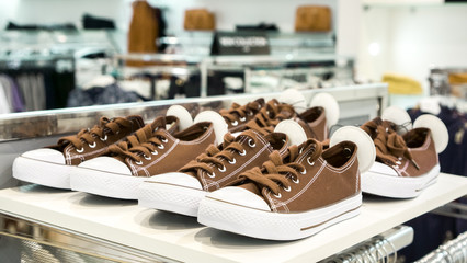 lots of colorful sneaker shoes on sale