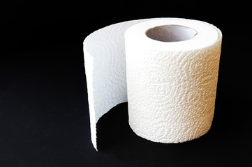 toilet paper on a black background