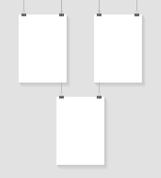 Vector template of three poster on clips . Vertical blank A4 mockup banner