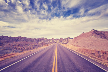 Fototapeta na wymiar Vintage toned scenic desert highway, travel concept, USA