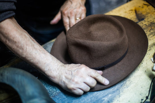 Hatter making a hat