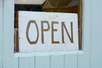 Open sign in window of business