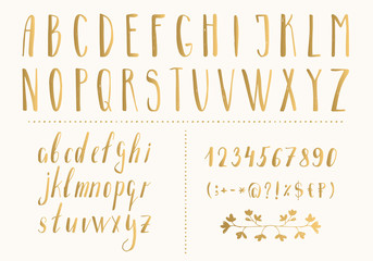 Golden hand drawn letters and numbers