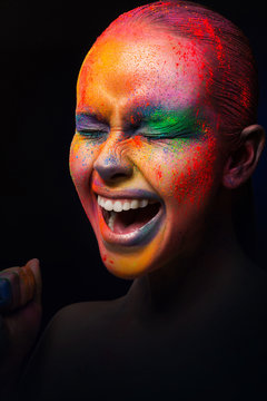 Beauty with colorful make-up, dark background