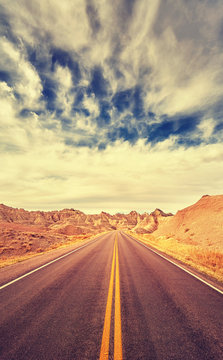 Color toned scenic desert highway, travel concept, USA.