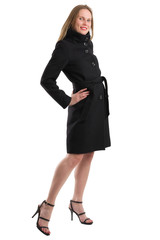 Attractive blonde woman in black winter coat, isolated on white