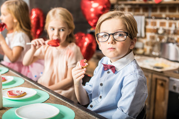 Boy eating cookie