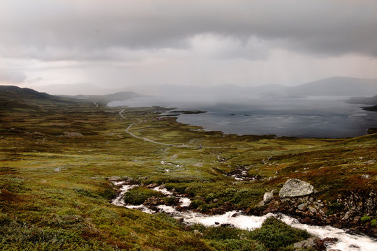 Small river streaming to lake Tyin in Norway
