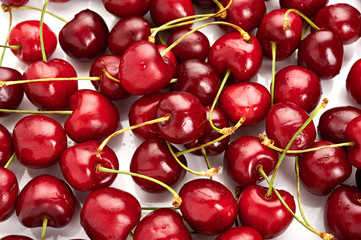 Fresh ripe cherries isolated on white background