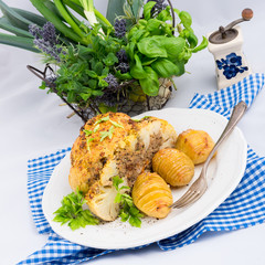 Stuffed cauliflower with mince and Hasselback potatoes
