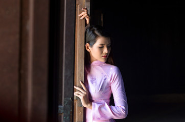 Beautiful  woman with Vietnam culture traditional dress,traditional costume ,vintage style,Vietnam