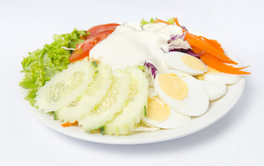 Vegetable salad isolated on white