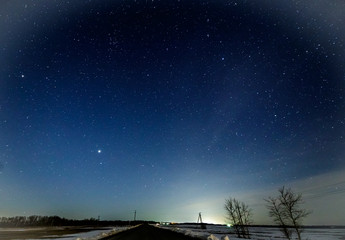 Starry sky over the field.