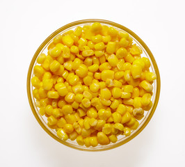 Canned corn on a white background.