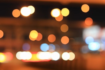 Fototapeta premium Abstract blurred bokeh in city night colorful beautiful of traffic in Bangkok Thailand, with copy space