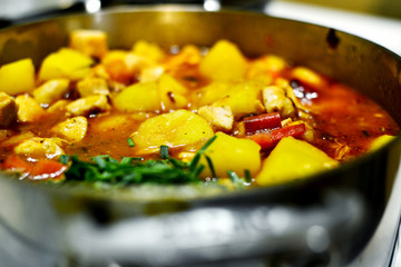 Freshly cooked vegetables and meat stew on the stove