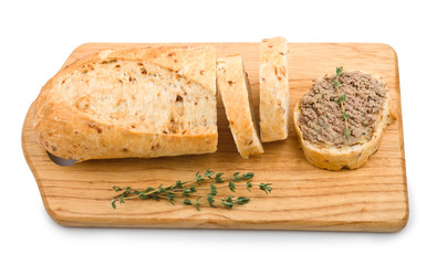 Slice of homemade bread with pate and herbs