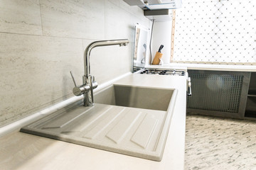 Modern creamy white kitchen clean interior design