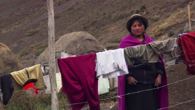 Rural Ecuadorean housewife and her drying laundry