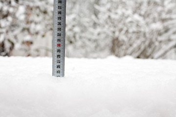 tape measure in snow - 139937449