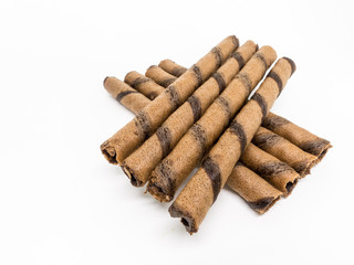 Isolated - Chocolate Wafer Roll on white background, shallow depth of field