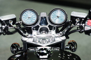 Naklejka premium Motorcycle control panel with speedometer dashboard in motorcycle.